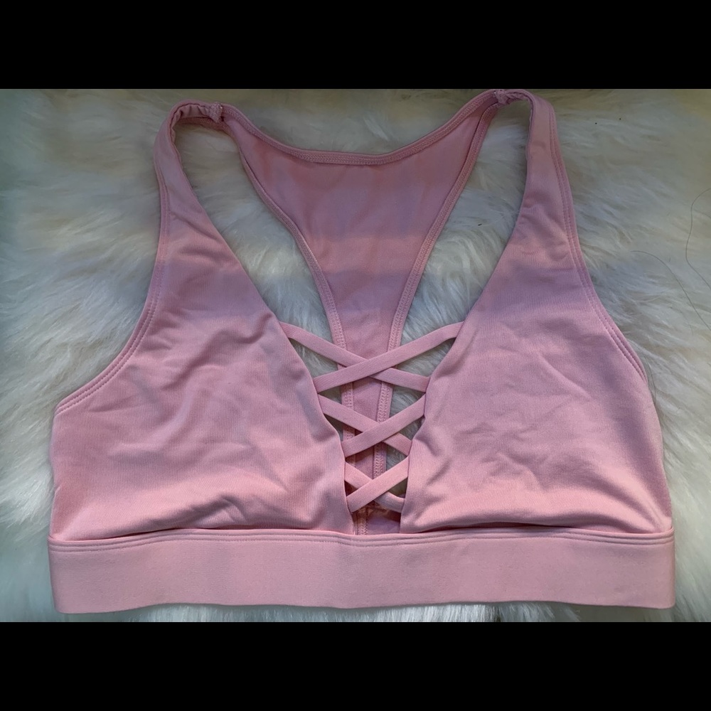 Pink Victoria’s Secret sports bra